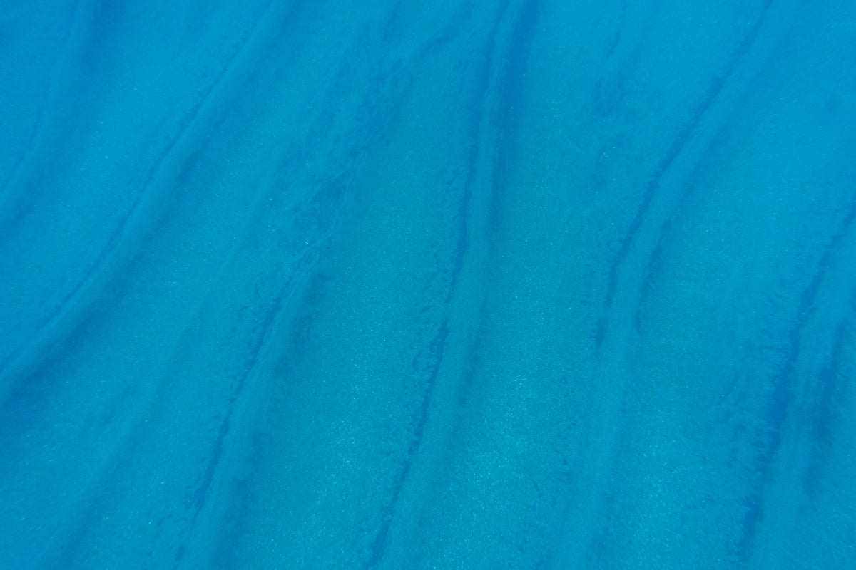 blue textile with white background