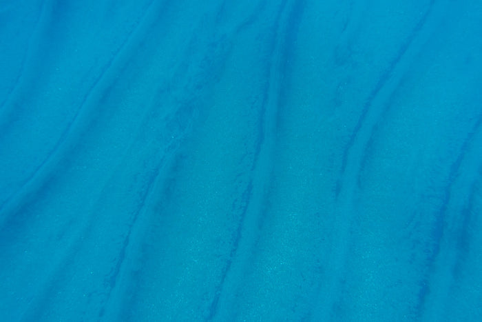 blue textile with white background