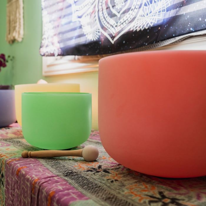 pink plastic container on brown wooden chopping board