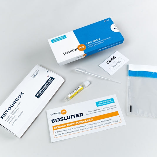 a white table topped with medical supplies and a package