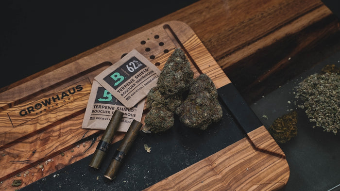 a rock and a cigarette on a table