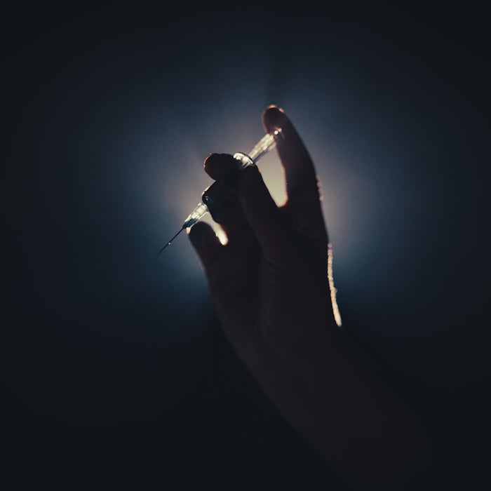 a person holding a light saber