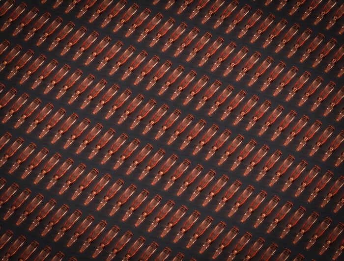 Many bottles are arranged in a pattern.