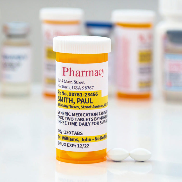 Prescription Medications: pill bottles and blister packs on a pharmacy counter with dosage labels, doctor instructions and a pharmacy bag