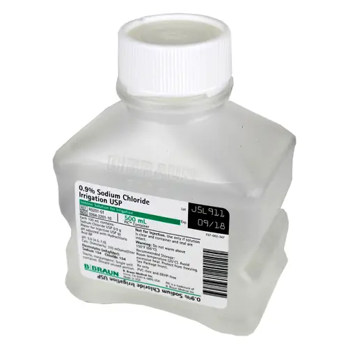 A close-up image of Wound Irrigation Solutions alongside dressings, antiseptic sprays, and first aid tools for optimal healing.