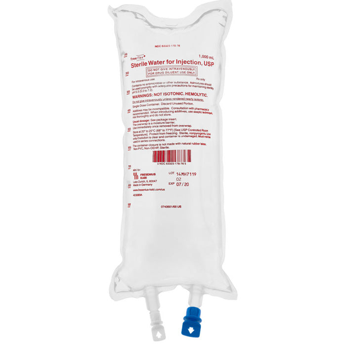 Clear IV bags and IV sets arranged on a hospital cart, used for intravenous fluid therapy, medication delivery, and patient hydration.
