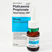 Brown glass nasal spray bottle with white spray cap and green safety lock, labeled for Fluticasone Propionate 50 mcg, intranasal use only