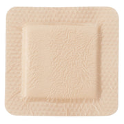 Beige hydrocellular foam wound dressing with textured surface and silicone adhesive border, sterile 4x4 inch size for moderate to heavy exuding wounds.