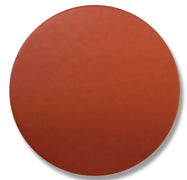 Round, orange-brown Niacin tablet with smooth surface, used for heart health and cholesterol management, isolated on white background