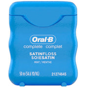 Close-up of blue Oral-B Satin Dental Floss container with white text, mint flavor, 50 meters, for dental care and fresh breath