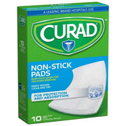 Green box of Curad Non-Stick Pads with white gauze pad illustration, sterile wound care for minor cuts and abrasions, SKU: 08225-6220-00