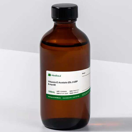 Vitamin E Acetate (DL) USP Liquid For Compounding (API) in lab setup, used for antioxidant-rich skincare and wellness formulations.