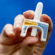 Kloxxado Naloxone Nasal Spray 8 mg in hand ready to dispense, crucial for fast opioid overdose reversal and emergency response.