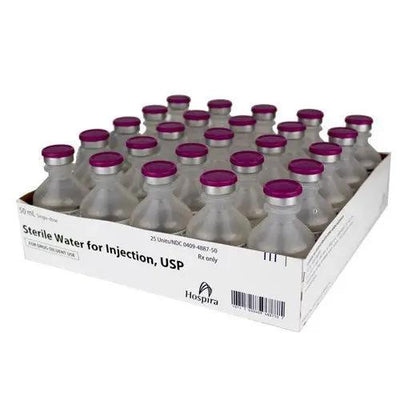 Sterile Water for Injection 50 mL Single-Use Vials on a clean tray, vital for reconstitution and ensuring safe, sterile medical preparations.